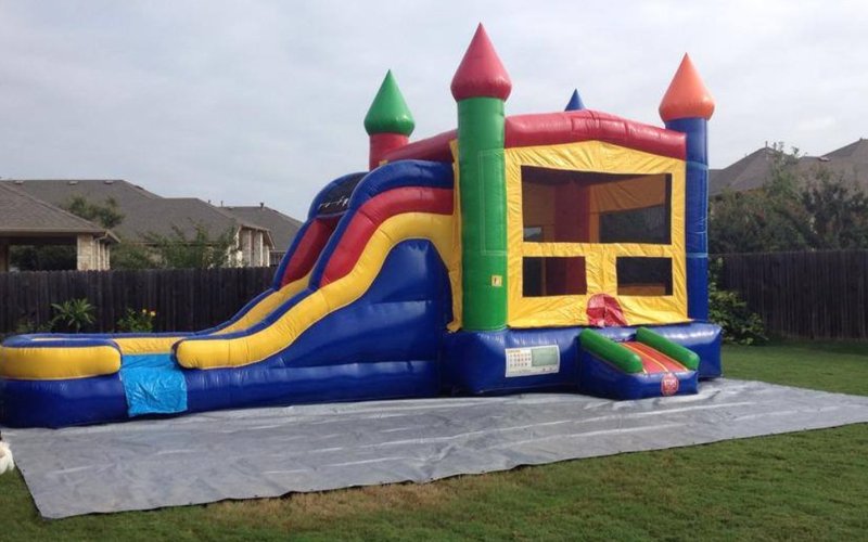 Castle combo bounce house rental Hutto TX with slide